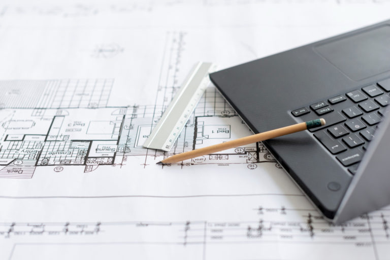 Estimation immobilière en ligne vs Estimation immobilière en présentiel - Image plans d'architecte Poli Real Estate